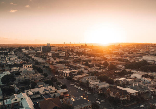 Aerial View Of City At Sunset